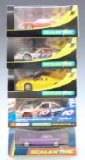 Five Hornby Scalextric model motor racing cars comprising Mercedes GTI No.1 C2081, Porsche GT1
