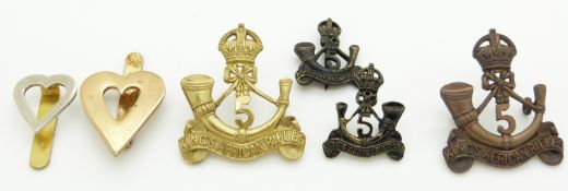 Six 5th King's African Rifles metal badges including an officer's example and collar badges, three