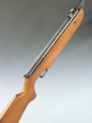 Cometa 300-S .22 air rifle with raised cheek piece and adjustable sights, serial number 20643.