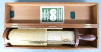 Fuller calculator spiral slide rule by Stanley, with twin brass readout markers, the inner drum with
