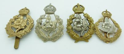 Four British Army Queen's Own Worcestershire Hussars Yeomanry metal cap badges including an all