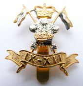 British Army 9th/12th Lancers officer's gilt cap badge