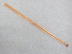 Brass or bronze measuring stick marked up to 325, likely for capacity of a tank or barrel, length