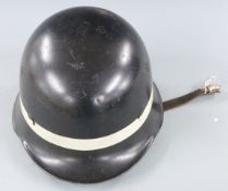 Post WWII German fireman's helmet, stamped to rim DIN 14940