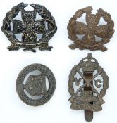 Four British Army Surrey Regiment, Inns of Court and Huddersfield Volunteers metal badges