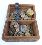 A collection of white metal/ silver filigree jewellery including bracelet, brooches, bracelet set