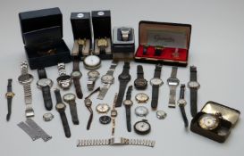 Thirty-three various ladies and gentleman's wristwatches including a ladies 9ct gold example,