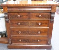 Victorian flame mahogany chest of two over three drawers with secret drawer to the top and carved