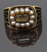 Georgian mourning ring set with plaited hair to the centre surrounded by seed pearls and decorated