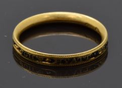 Georgian mourning ring set with black enamel reading 