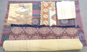 Five large modern rugs and wall hangings, including three large geometric pattern rugs and a wall