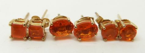 Three pairs of 9ct gold earrings set with fire opal, 2.6g