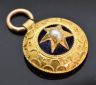 Victorian Etruscan Revival pendant set with a seed pearl and blue enamel, 1.8cm diameter