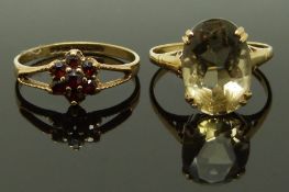 Two 9ct gold rings, one set with quartz and the other garnets, sizes M & N, 3.84