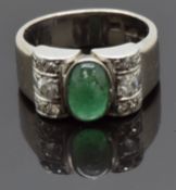 Art Deco 18ct white gold ring set with an emerald cabochon and six old cut diamonds, size J/K, 9.62g