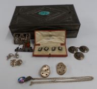 A pair of silver and enamel cufflinks, The Goldsmiths and Company box, silver brooches, pair of