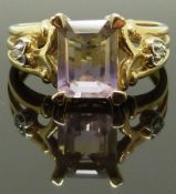 A 9ct gold ring set with a quartz and diamonds, size N, 3.62g