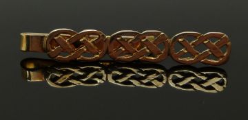 A 9ct gold tie clip in a Celtic design, 3.3g