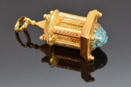 An 18ct gold charm, 12.1g