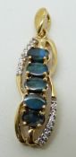 A 9ct gold pendant set with five boulder opals (total 1.6ct) and zircon, 4.1g