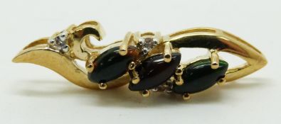 A 9ct gold pendant set with three marquise cut Mezezo opal cabochons and white sapphires, 3.8g