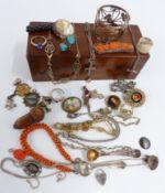A collection of jewellery including Chinese silver brooch set with carved coral, cameo brooch,