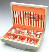 A canteen of Phillip Ashberry cutlery, six plate settings in retro Formica topped canteen