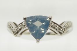 A 9ct white gold ring set with a trilliant cut green fire opal and diamonds, 2.8g, size N