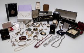 A collection of costume jewellery including silver watch, Miracle brooch, beads, coins, necklace