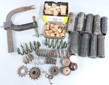 Collection of various vintage motorcycle parts to include vintage saddle springs, footrest