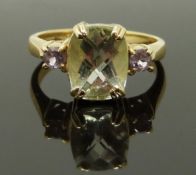 A 9ct gold ring set with quartz and amethyst, size N, 3.91g