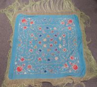 A 19th/20thC Chinese shawl with embroidered floral decoration and long fringe, 200 x 200cm including