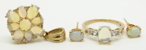 A 9ct gold ring (size J), pendant and earrings all set with an oval jelly opals, 5.3g