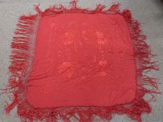 A 19th/20thC Chinese burgundy coloured shawl with embroidered chrysanthemum decoration and beaded
