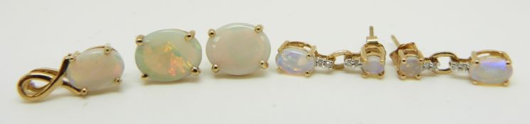 Two pairs of 9ct gold earrings set with opals and a 9ct gold pendant set with an opal, 3.4g