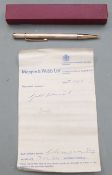 9ct gold propelling pencil with engine turned finish, in box with original Mappin & Webb packing