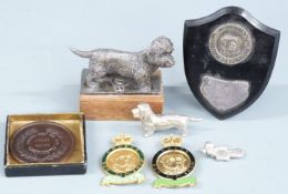 Dandie Dinmont plated dog car mascot or similar, length 8cm, Cruft's badges and trophies including