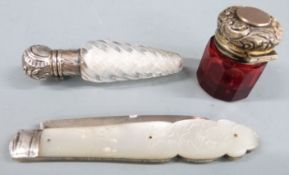Hallmarked silver and mother of pearl folding fruit knife and two white metal lidded scent bottles