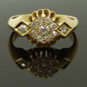 An early 20thC 18ct gold ring set with old cut diamonds, 3.6g, size J/K
