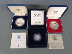 Three Royal Mint silver proof cased coins comprising Queen's Silver Jubilee, Charles and Diana
