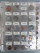 'Money of the World' album containing an amateur collection of overseas coinage
