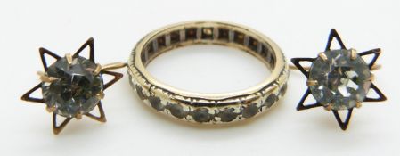 A pair of 9ct gold earrings set with foiled paste and a 9ct gold eternity ring, 3.3g