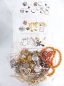 A collection of jewellery including silver rings, pearl necklace, brooches including cameo and
