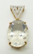 A 9ct gold pendant set with an oval cut ice opal and diamonds, 4.5g