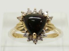 A 9ct gold ring set with a trilliant cut Mezezo opal cabochon and white sapphires, 2.8g, size N