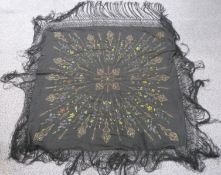 A 19th/20thC Chinese shawl with printed and gold thread decoration and fringe, 210 x 210 including