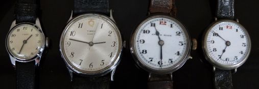 Four wristwatches comprising one Swiss silver trench style, a similar nickel example and two