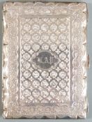 Victorian hallmarked silver calling card case with engraved decoration, opening to reveal lined
