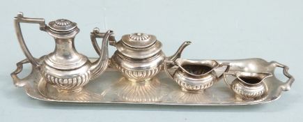 Novelty hallmarked silver tea set on tray comprising tray, teapot, sugar bowl and milk jug, London