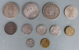 A collection of silver coins comprising Victorian 1845 wreath crown, 1898 veiled head example,